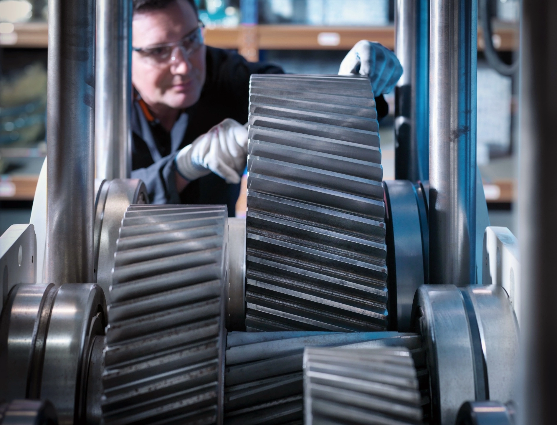 Worker testing the hardness of the gears